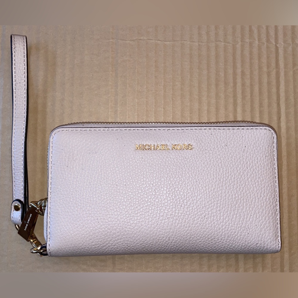Pale Pink Michael Kors Wristlet with Gold Hardware. Brand new, never used.
